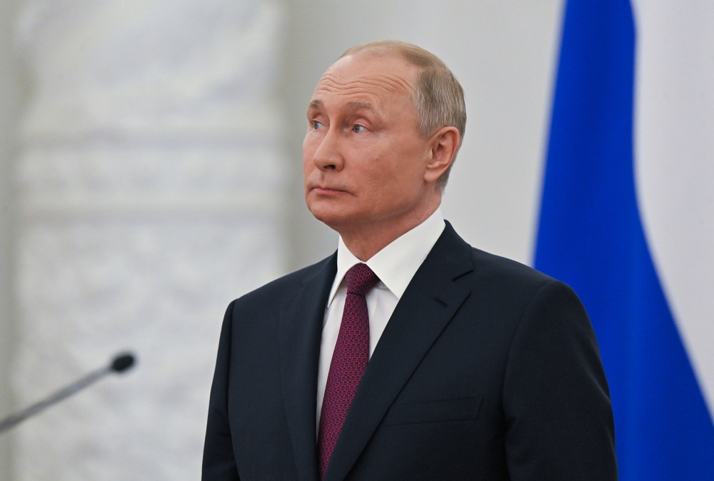 Russian President Vladimir Putin attends a ceremony to present the Russian Hero of Labour gold medals and national awards at the Kremlin in Moscow, Russia. Sputnik/Mikhail Klimenty