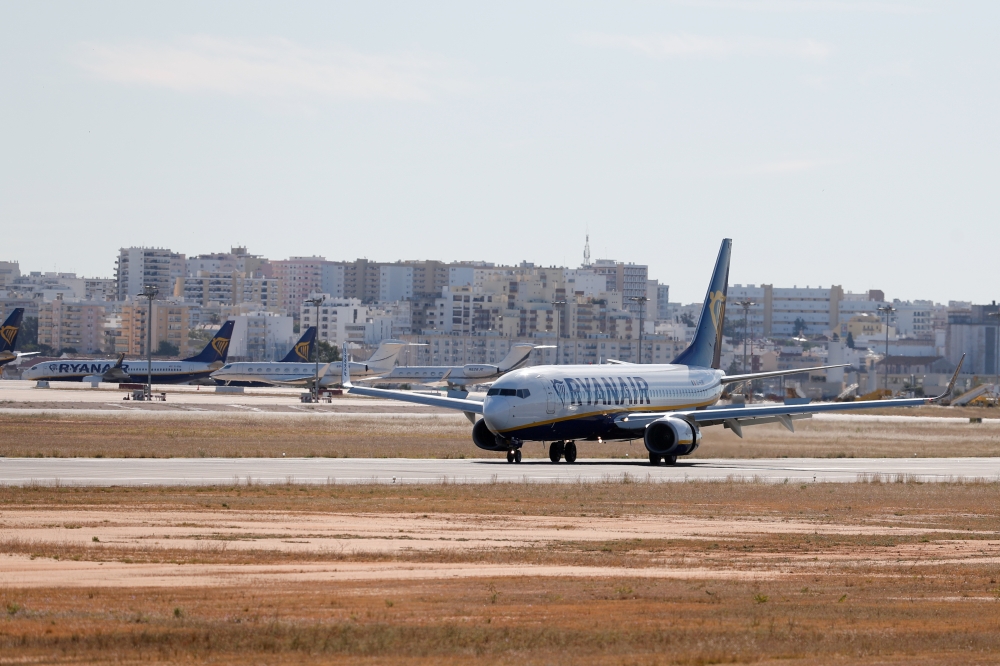 A Ryanair flight from Manchester arrives at Faro Airport on the first day that Britons are allowed to enter Portugal without needing to quarantine on May 17, 2021. (Reuters/File Photo)