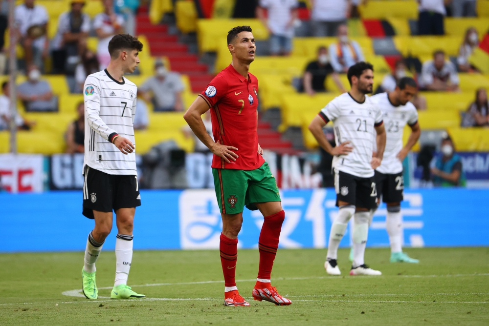 Portugal's Cristiano Ronaldo and Germany's Kai Havertz (REUTERS/Kai Pfaffenbach)