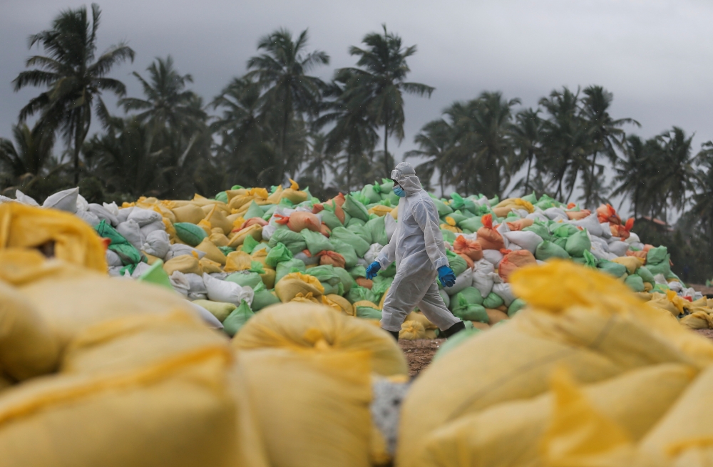Debris including burned fiberglass and tons of plastic pellets have severely polluted the surrounding waters and a long stretch of the island nation’s famed beaches.