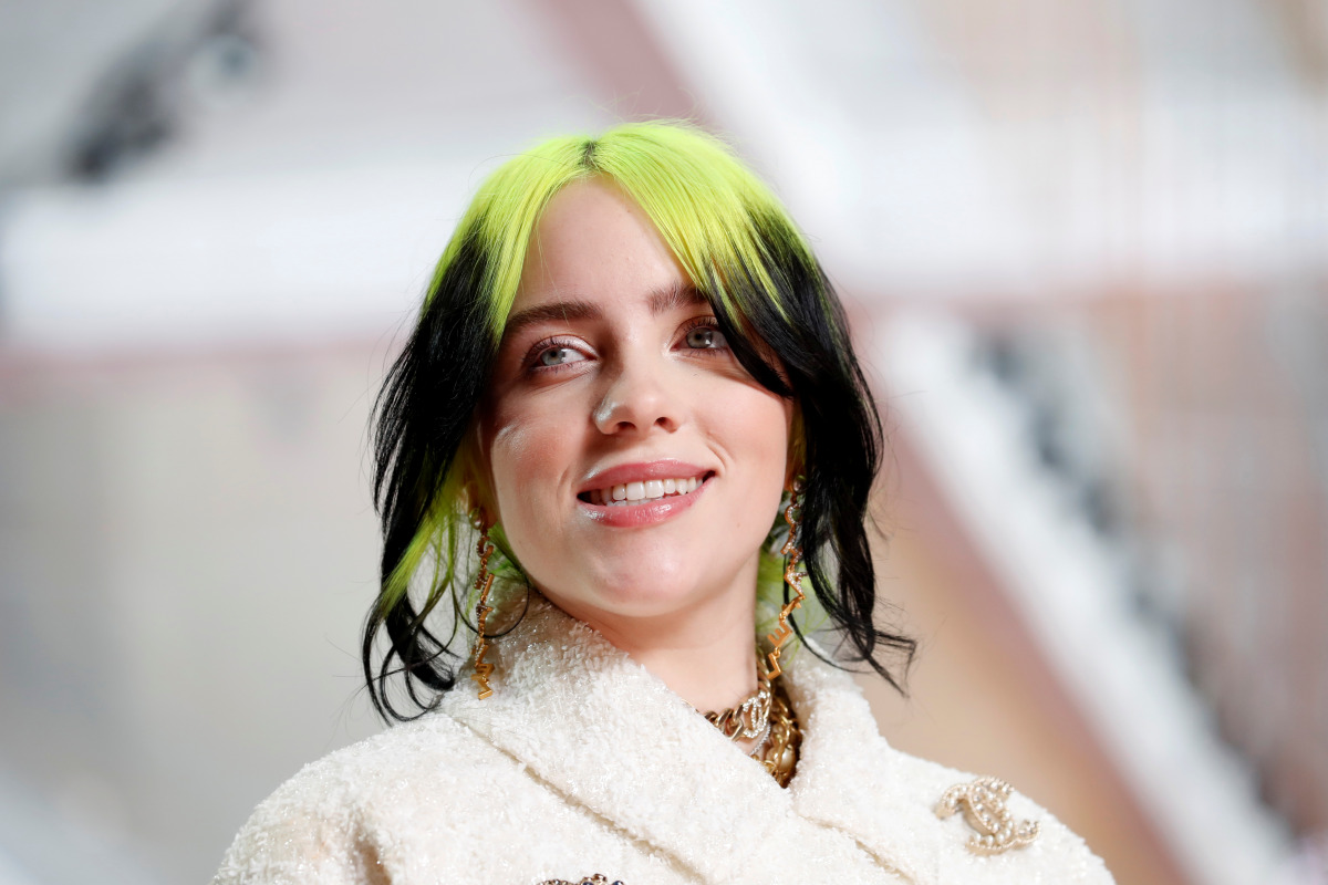 FILE PHOTO: Billie Eilish in Chanel during the Oscars arrivals at the 92nd Academy Awards in Hollywood, Los Angeles, California, U.S., February 9, 2020. REUTERS/Mike Blake/File Photo
