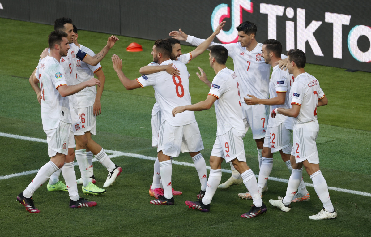 Soccer Football - Euro 2020 - Group E - Slovakia v Spain - La Cartuja Stadium, Seville, Spain - June 23, 2021 Spain's Pablo Sarabia celebrates scoring their third goal with teammates Pool via REUTERS/Julio Munoz
