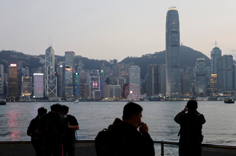 A general view of the Central financial district during sunset, in Hong Kong, China March 11, 2021. REUTERS/Tyrone Siu
