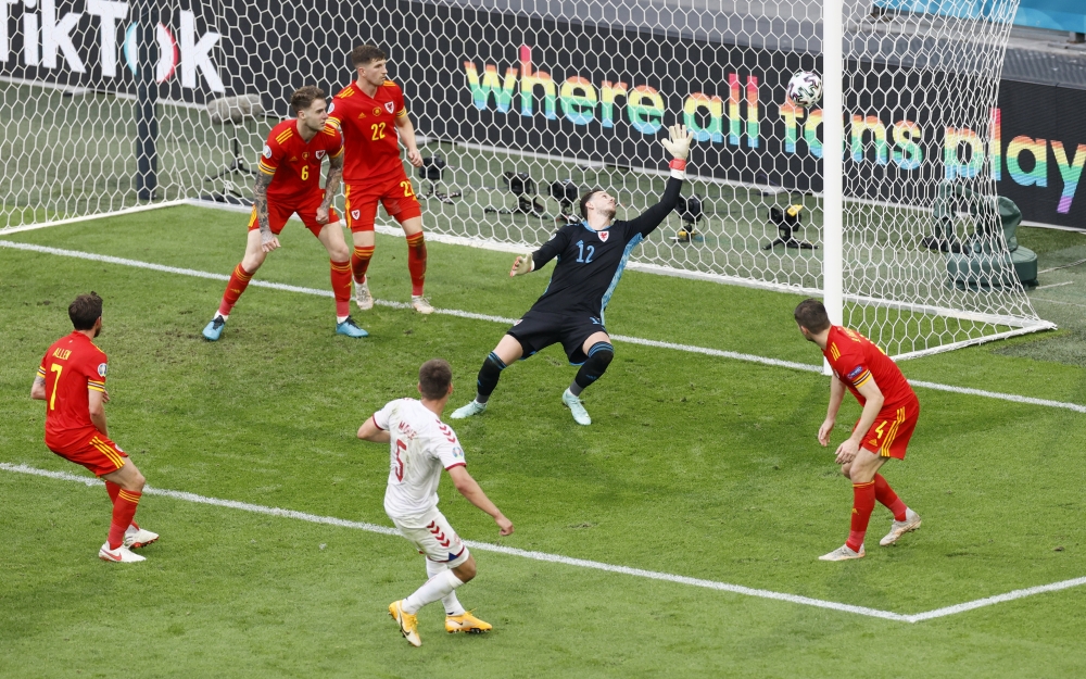 Denmark's Joakim Maehle scores their third goal (Reuters/Koen Van Weel)