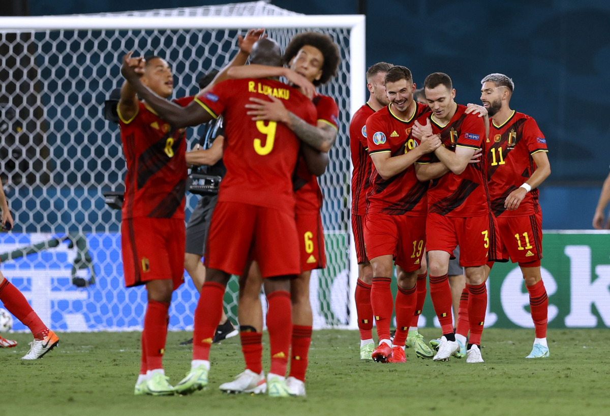 Soccer Football - Euro 2020 - Round of 16 - Belgium v Portugal - La Cartuja Stadium, Seville, Spain - June 27, 2021 Belgium's players celebrate after the match Pool via REUTERS/Marcelo Del Pozo
