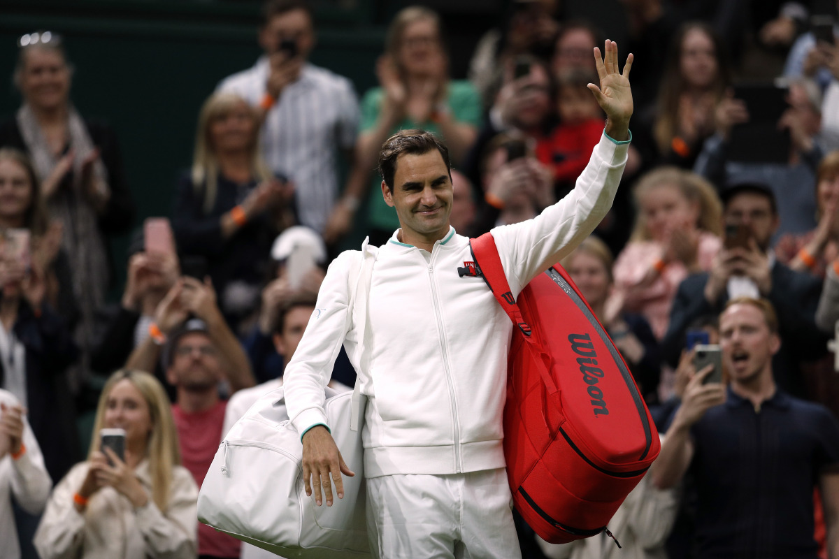 Tennis - Wimbledon - All England Lawn Tennis and Croquet Club, London, Britain - June 29, 2021 Switzerland's Roger Federer leaves court after winning his first round match against Fance's Adrian Mannarino REUTERS/Peter Nicholls
