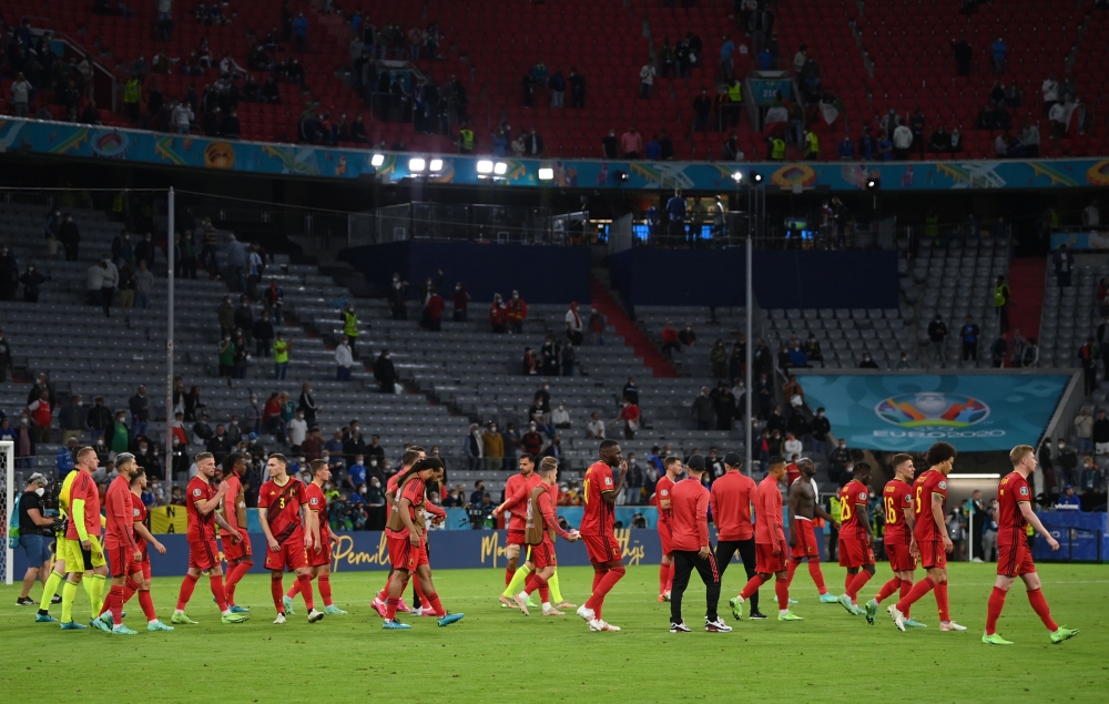 Belgium players after the match Pool via REUTERS/Matthias Hangst