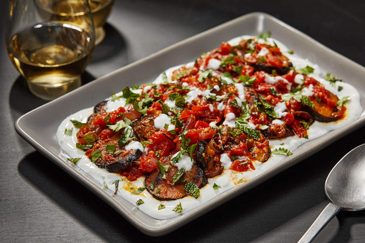 Afghan-Style Grilled Eggplant With Tomato Sauce, Yogurt and Herbs. (Photo by Tom McCorkle for The Washington Post)