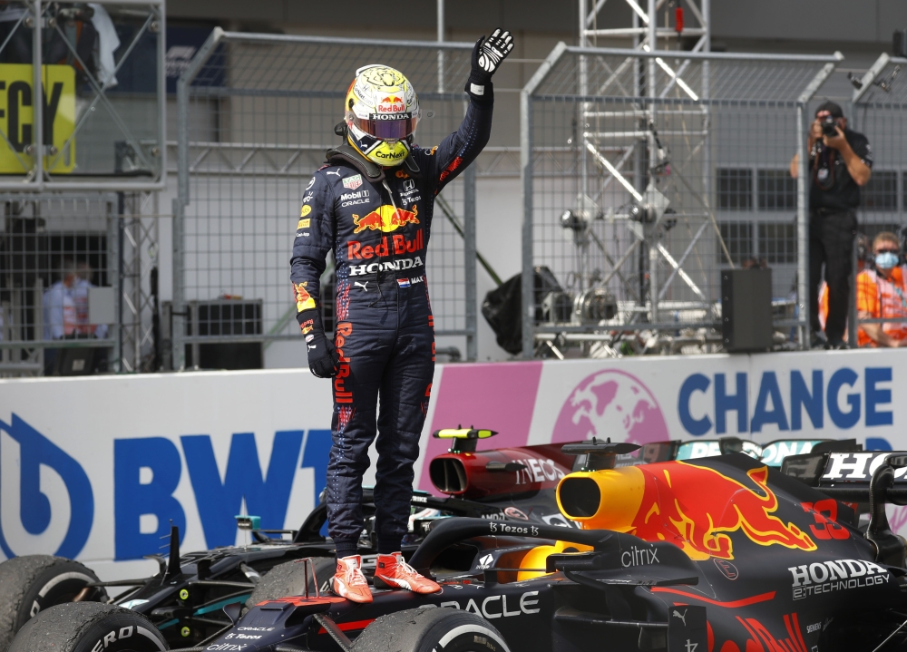 Red Bull's Max Verstappen celebrates winning the race (REUTERS/Leonhard Foeger)