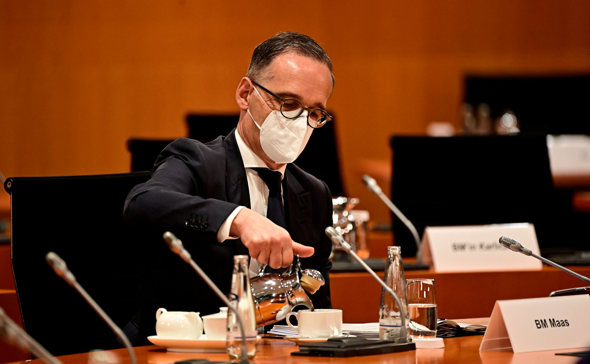 FILE PHOTO: German Foreign Minister Heiko Maas prepares for the weekly cabinet meeting in Berlin, Germany June 30, 2021. Tobias Schwarz/Pool via REUTERS/File Photo
