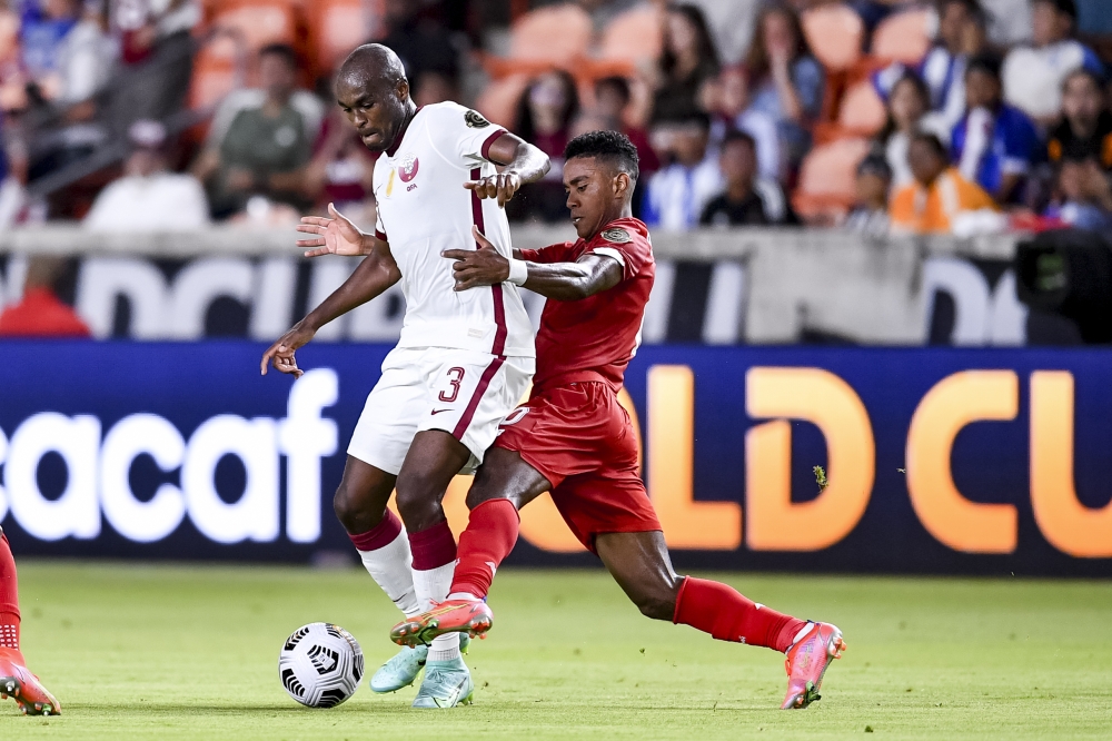  Qatar defender Abdelkarim Hassan (3) and Panama midfielder Edgar Barcenas (10) battle for the ball during the CONCACAF Gold Cup Soccer group stage play at BBVA Stadium. Mandatory Credit: Maria Lysaker