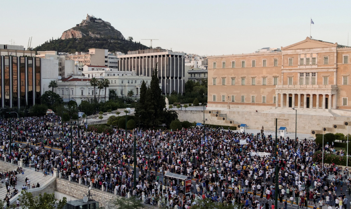 Anti-vaccine protesters take part in a demonstration outside the parliament building after the government announced mandatory vaccinations for certain sectors, in Athens, Greece, July 14, 2021. REUTERS/Vassilis Triandafyllou
