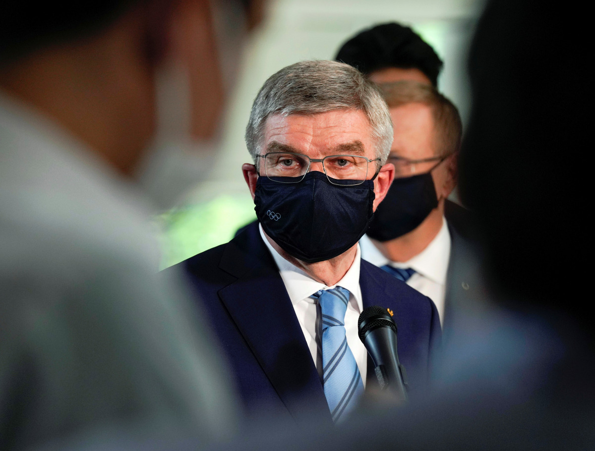 International Olympic Committee President Thomas Bach speaks to journalists after a meeting with Japanese Prime Minister Yoshihide Suga, in Tokyo, Japan, July 14, 2021. Kimimasa Mayama/Pool via REUTERS
