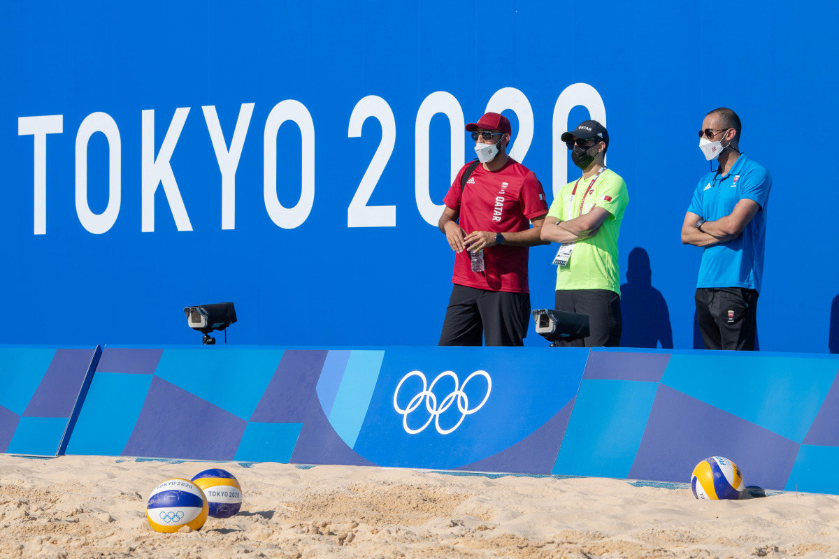 QOC Secretary General Jassim bin Rashid Al Buenain attending beach volleyball practice session.