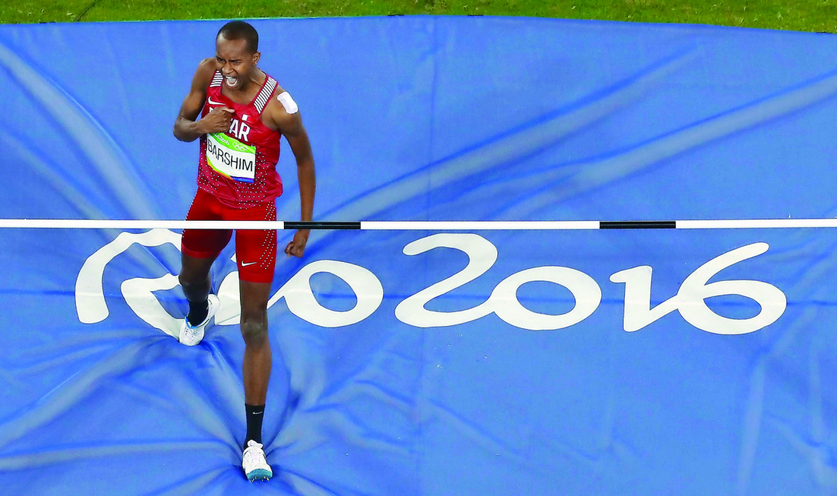 Qatar's Mutaz Essa Barshim reacts after clearing the bar during the men’s high jump final of the 2016 Rio Olympics in this August 16, 2016 file photo. 