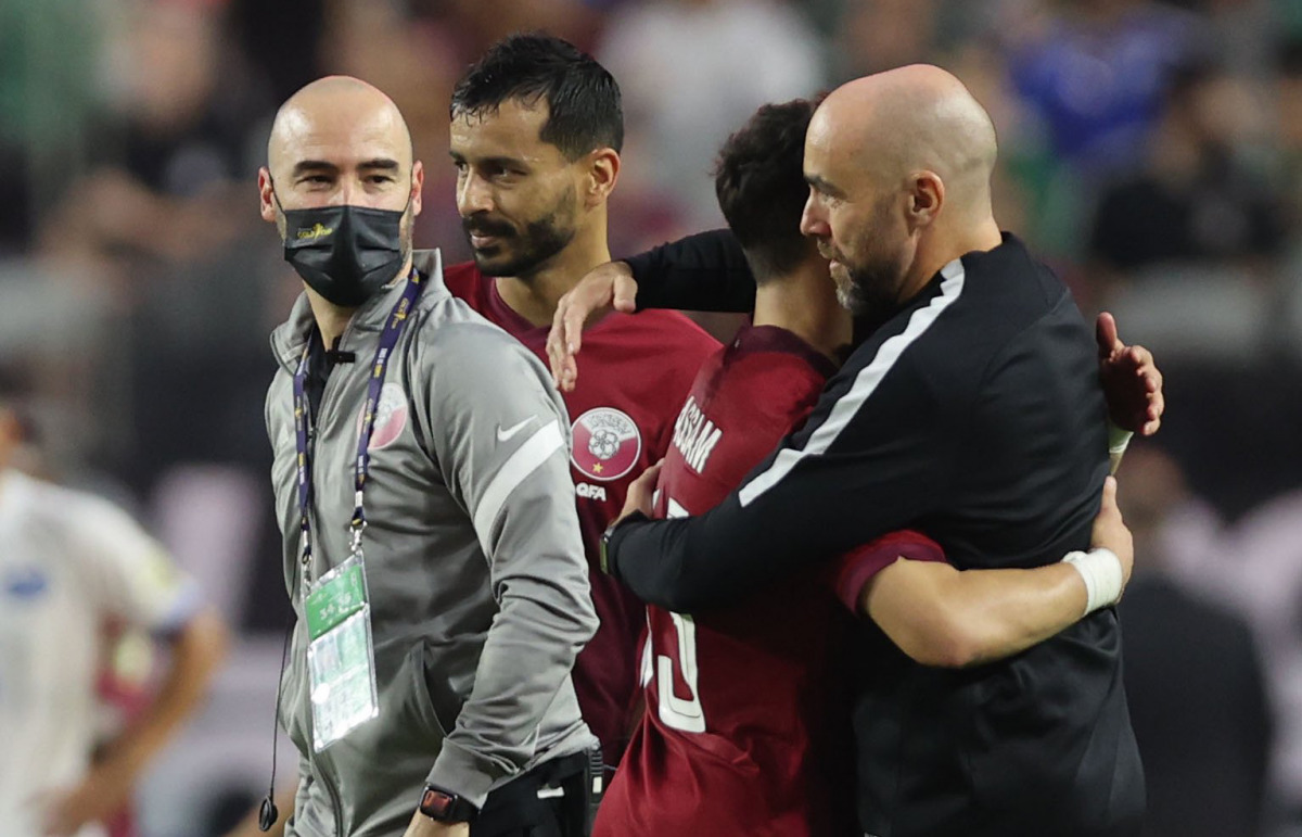 Qatar coach Felix Sanchez celebrates after yesterday's win.