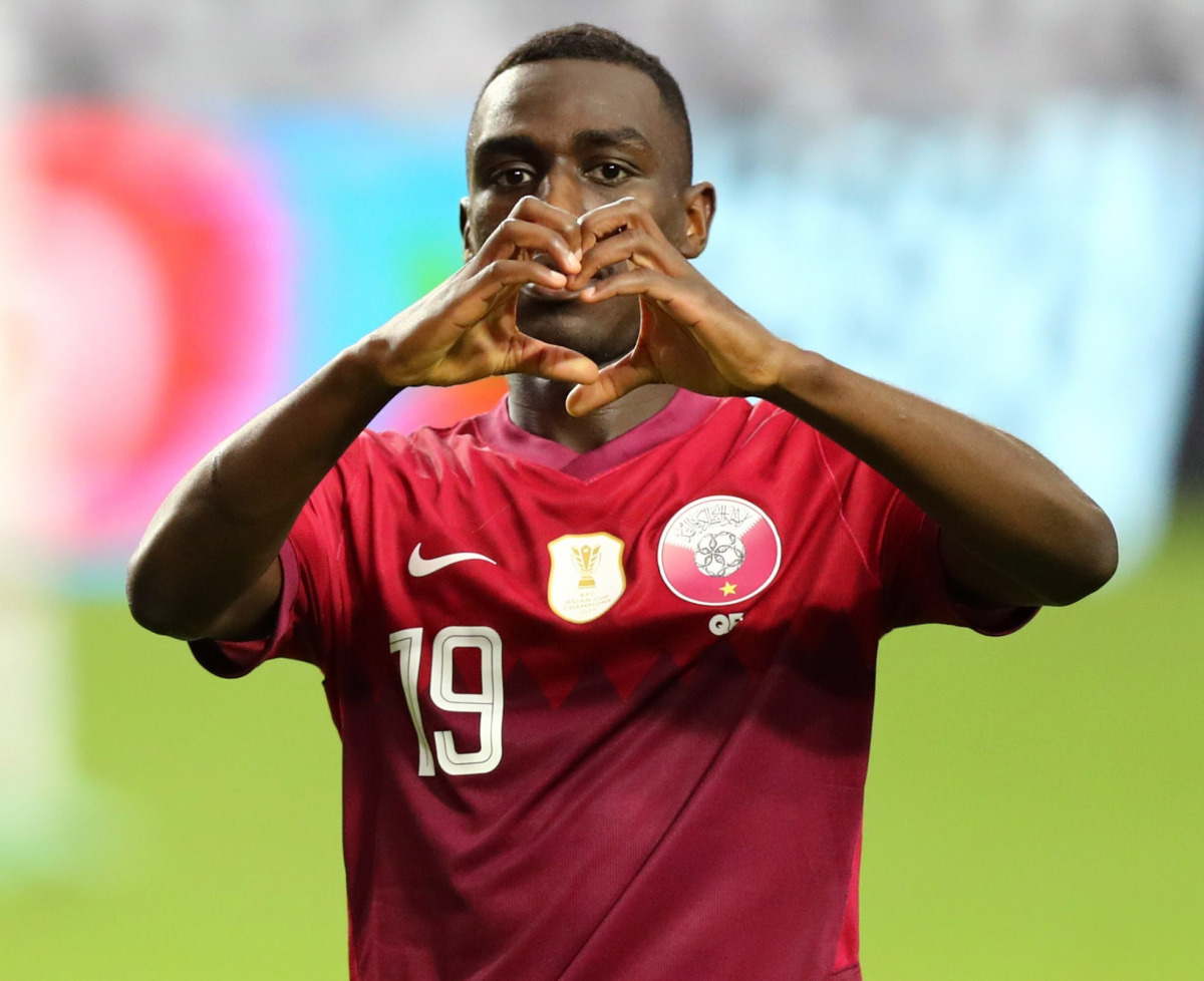Qatar forward Al Moez Ali (19) motions after scoring a goal against El Salvador in the second half during a CONCACAF Gold Cup quarterfinal soccer match at State Farm Stadium. Billy Hardiman-USA TODAY Sports