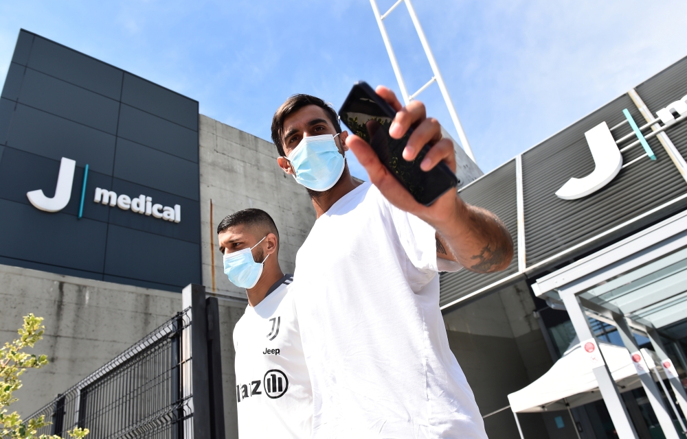 July 14, 2021 Juventus' Mattia Perin and Hamza Rafia arrives for training REUTERS/Massimo Pinca/File Photo
