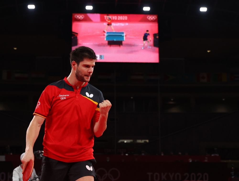 July 30, 2021. Dimitrij Ovtcharov of Germany reacts during his match against Lin Yun-Ju of Taiwan REUTERS/Thomas Peter