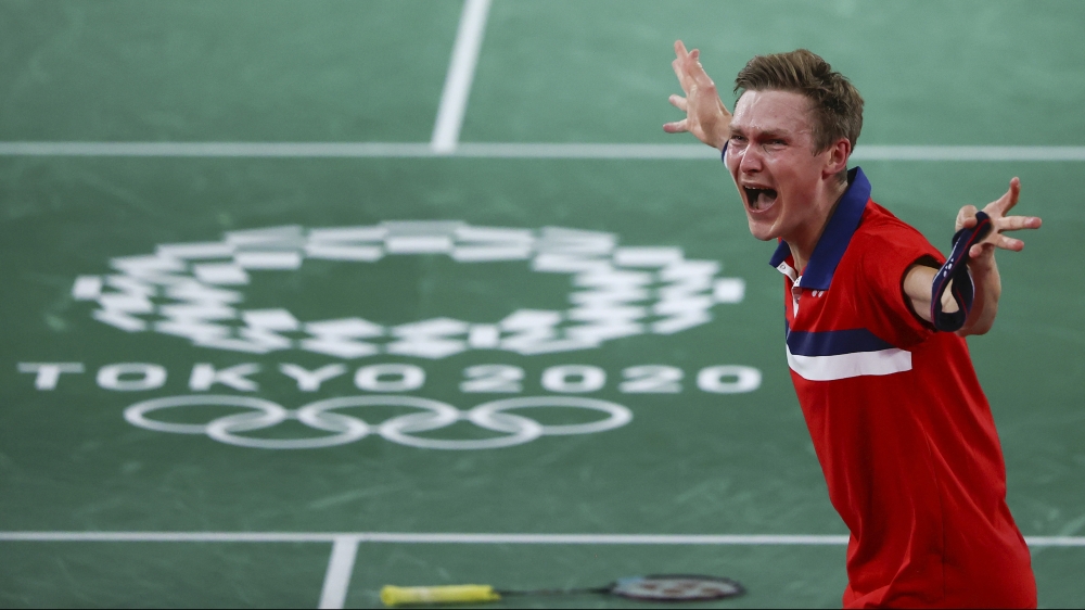 Viktor Axelsen of Denmark reacts after winning the match against Chen Long of China. REUTERS/Hamad I Mohammed