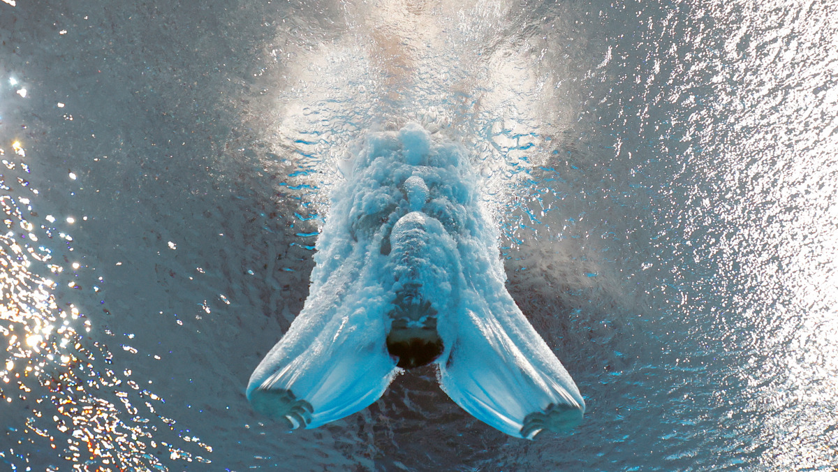 Tokyo 2020 Olympics - Diving - Men's 10m Platform - Preliminary Round - Tokyo Aquatics Centre, Tokyo, Japan - August 6, 2021. Yang Jian of China in action REUTERS/Stefan Wermuth
