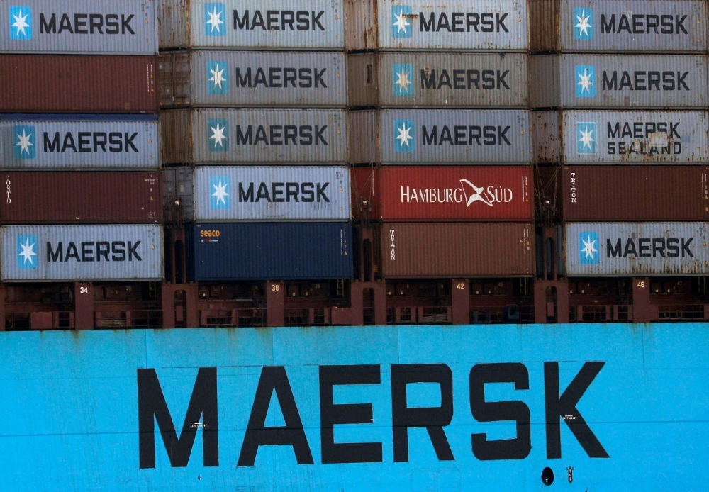 Shipping containers are transported on a Maersk Line vessel through the Suez Canal in Ismailia, Egypt. REUTERS/File Photo