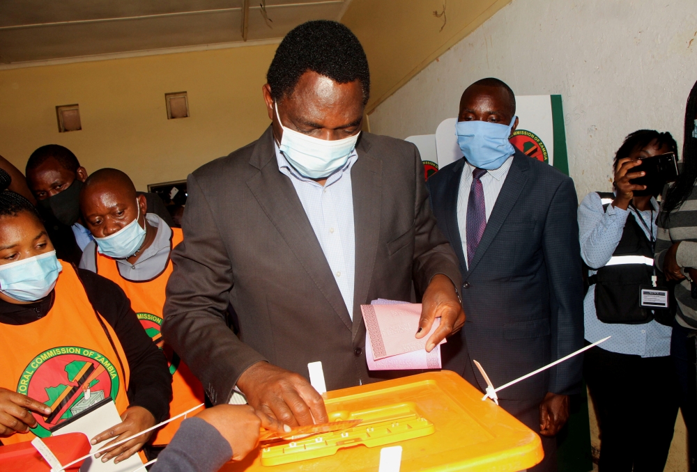 FILE PHOTO: Opposition UPND party's presidential candidate Hakainde Hichilema casts his ballot in Lusaka, Zambia, August 12, 2021. REUTERS/Jean Ndaisenga