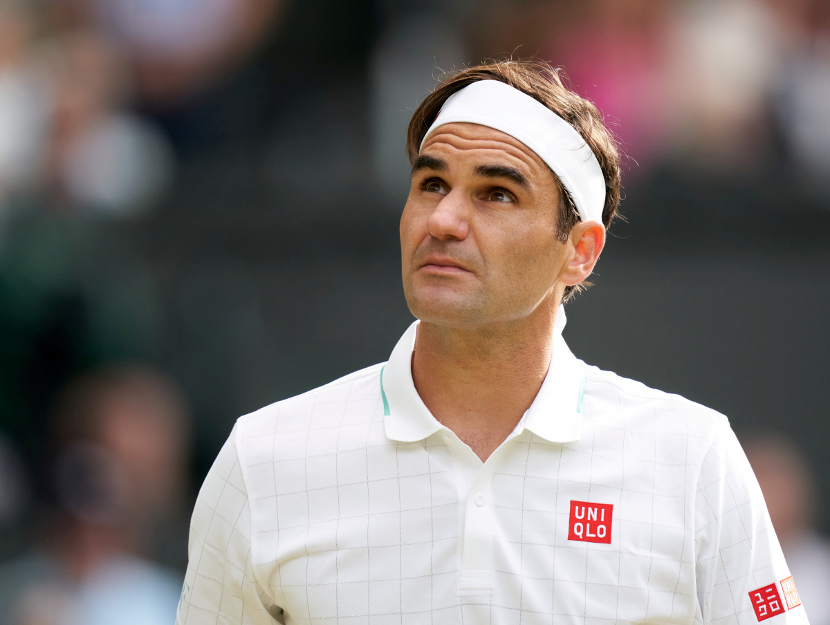 FILE PHOTO: Jul 7, 2021; London, United Kingdom; Roger Federer (SUI) plays against Hubert Hurkacz (POL) in the quarter finals at All England Lawn Tennis and Croquet Club. Mandatory Credit: Peter van den Berg-USA TODAY Sports/File Photo
