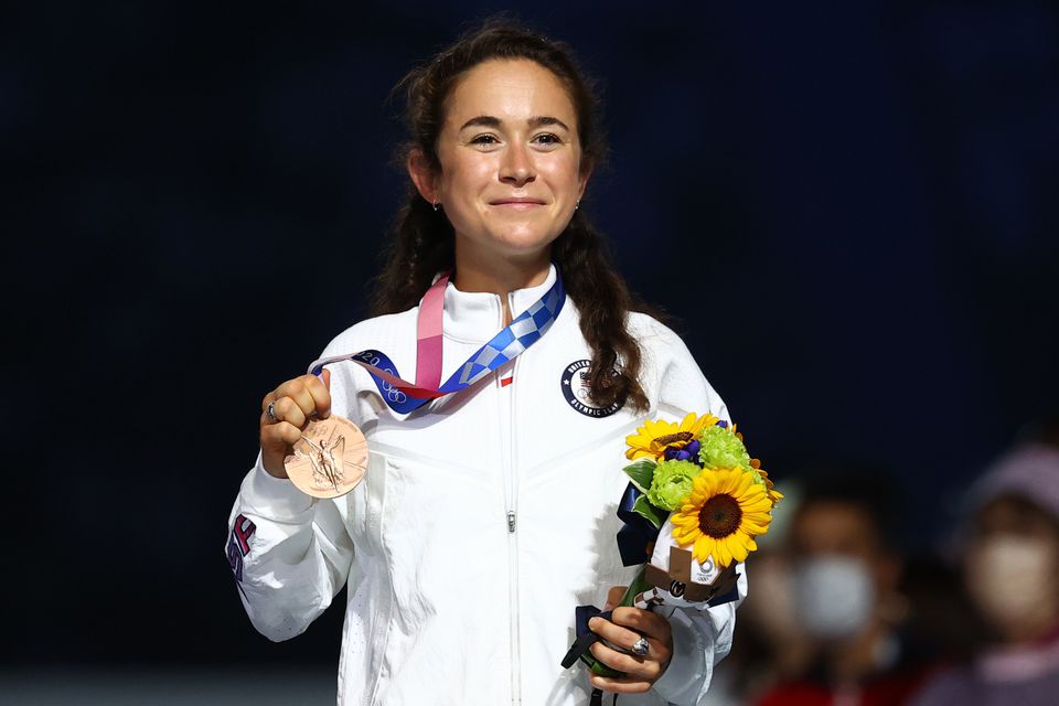Tokyo 2020 Olympics - Athletics - Women's Marathon - Medal Ceremony - Olympic Stadium, Tokyo, Japan – August 8, 2021. Bronze medallist Molly Seidel of the United States celebrates on the podium REUTERS/Antonio Bronic

