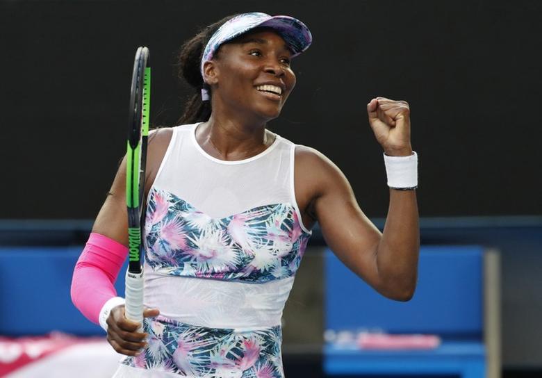 FILE PHOTO: Venus Williams of the U.S. reacts after winning the match against Romania's Mihaela Buzarnescu. REUTERS/Kim Kyung-Hoon

