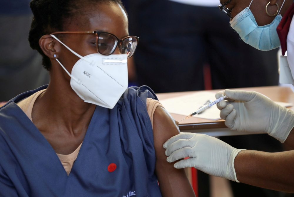 File photo: A healthcare worker receives the Johnson and Johnson coronavirus disease (COVID-19) vaccination at the Chris Hani Baragwanath Academic Hospital in Soweto, South Africa, Feb. 17, 2021. Reuters/Siphiwe Sibeko/File Photo