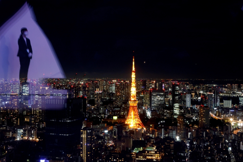 A view of Tokyo city from a building's observatory in Tokyo, Japan, August 20, 2021. REUTERS/Ivan Alvarado