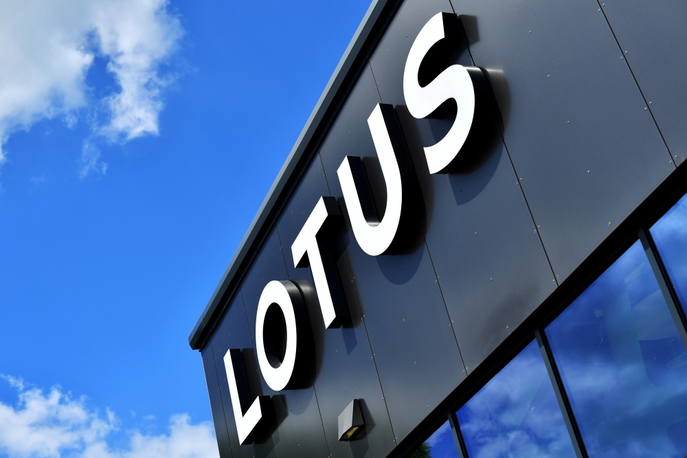 A Lotus sign is seen at the car plant headquarters in Hethel, Britain June 23, 2021. Picture taken June 23, 2021. REUTERS/Dylan Martinez/File Photo