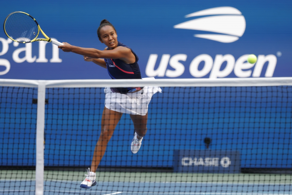 Leylah Fernandez of Canada hits a forehand against Elina Svitolina of Ukraine (not pictured) on day nine of the 2021 U.S. Open tennis tournament at USTA Billie Jean King National Tennis Center. Geoff Burke-USA TODAY Sports