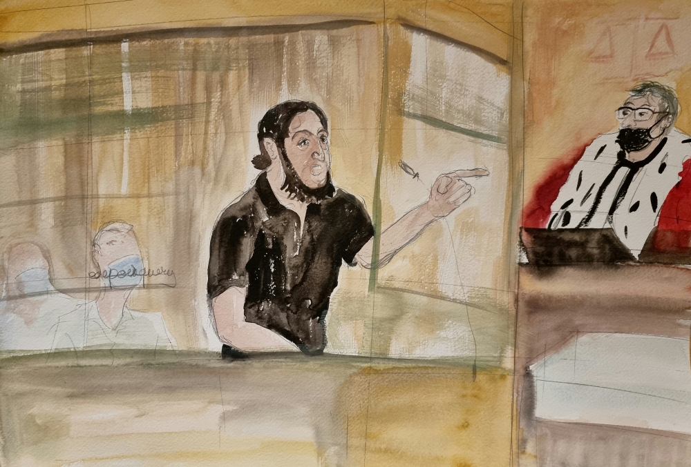 An artist's sketch shows Salah Abdeslam on the first day of trial at the Paris courthouse on the Ile de la Cite in Paris, France, September 8, 2021. Sketch released September 8, 2021. Elisabeth de Pourquery/France Televisions via Reuters.