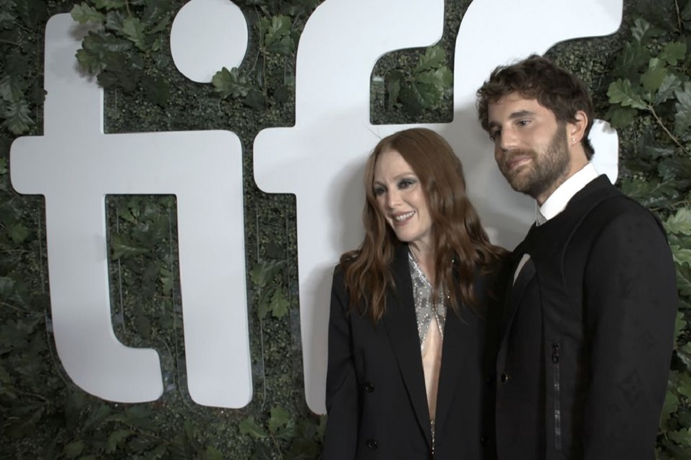 Ben Platt and Julianne Moore pose on the red carpet of Dear Evan Hansen which opens the 46th Toronto International Film Festival (TIFF) in Toronto, Ontario, Canada September 9, 2021 in a still image from video. REUTERS/Dennis Porter