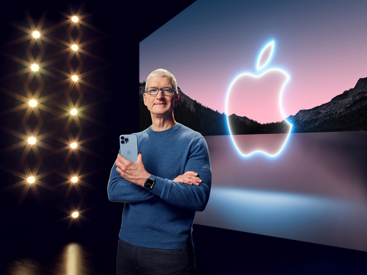 Apple CEO Tim Cook holds the iPhone 13 Pro Max and Apple Watch Series 7 during a special event at Apple Park in Cupertino, California broadcast September 14, 2021. Apple Inc/Handout via REUTERS 