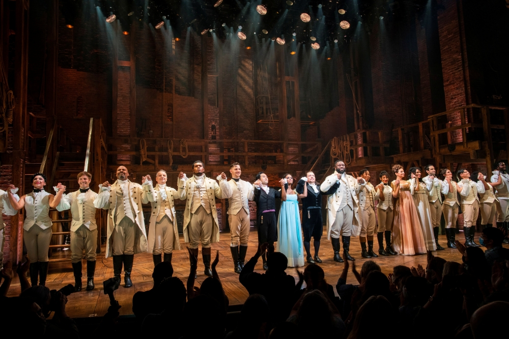 Actors greet the audience at the Richard Rogers theater during curtain call of the first return performance of Hamilton as Broadway shows begin to re-open to live audiences after being closed for more than a year due to the outbreak of the coronavirus dis