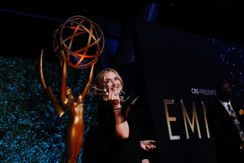Kate Winslet poses for a picture with the award for outstanding lead actress in a limited or anthology series or movie, for 