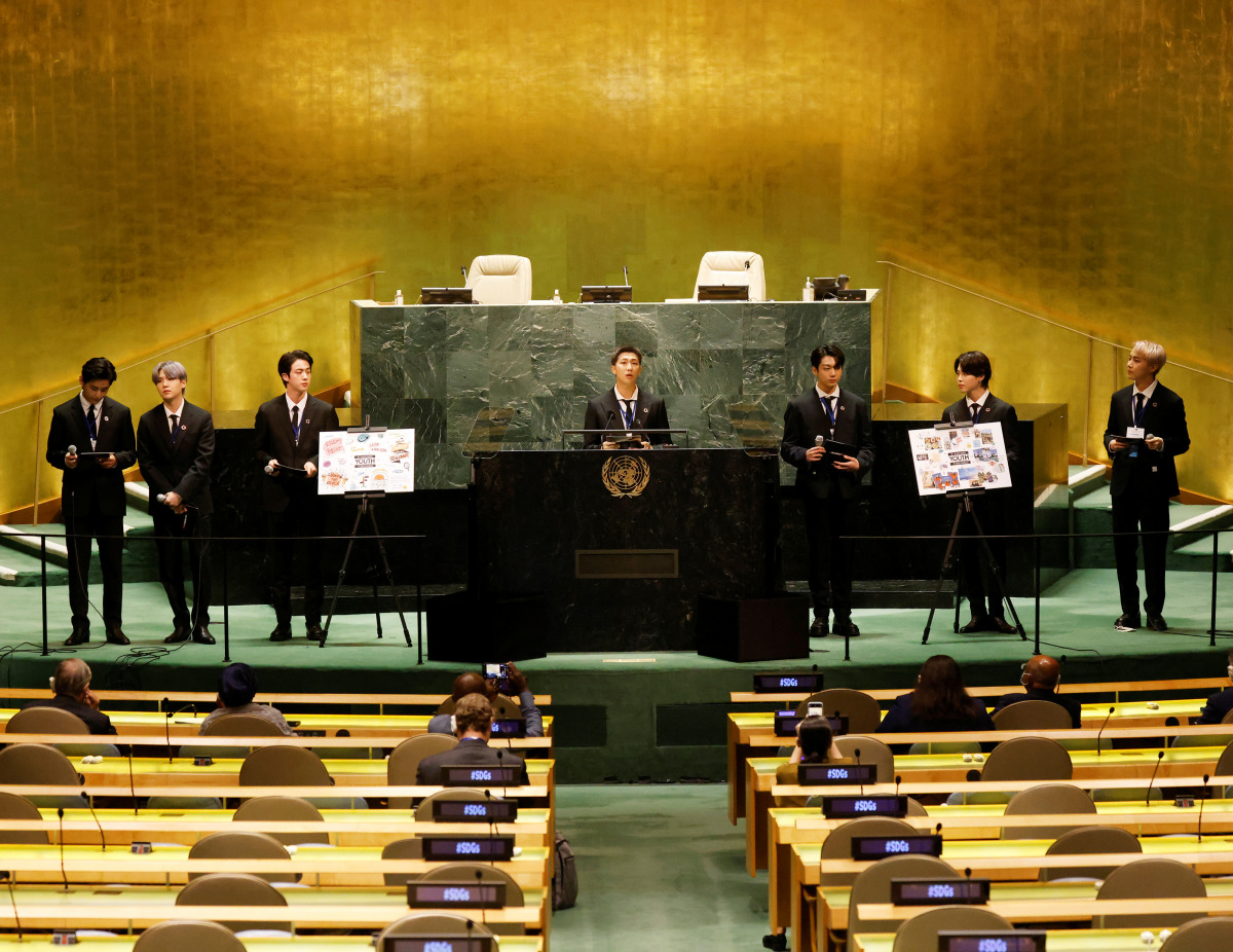 (L to R) Taehyung/V, Suga, Jin, RM, Jungkook, Jimin and J-Hope of South Korean boy band BTS speak at the SDG Moment event as part of the UN General Assembly 76th session General Debate in UN General Assembly Hall at the United Nations Headquarters, in New
