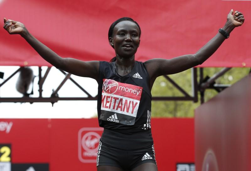 FILE PHOTO: Kenya's Mary Jepkosgei Keitany celebrates winning the Women's Elite race Action Images via Reuters / Matthew Childs Livepic
