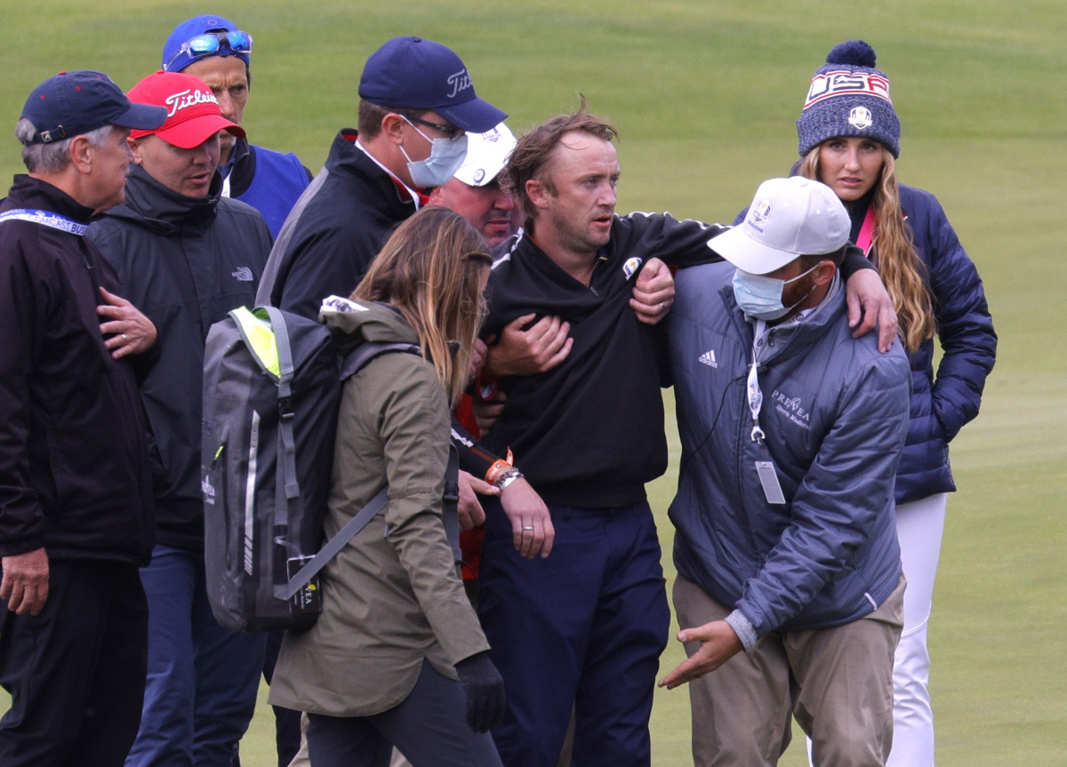 Actor Tom Felton receives medical attention during a practice round REUTERS/Mike Segar
