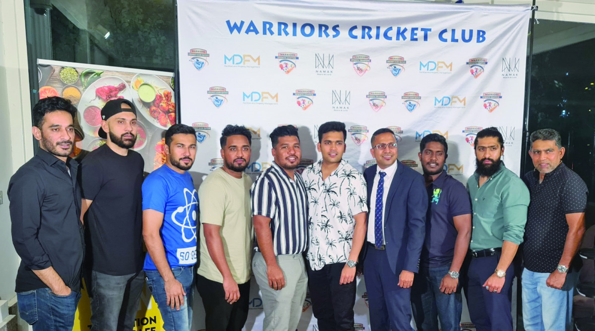 Warriors players, who signed fresh contracts for the new season, pose for a group picture with Kushal Kumar, manager of the club during the ceremony. 