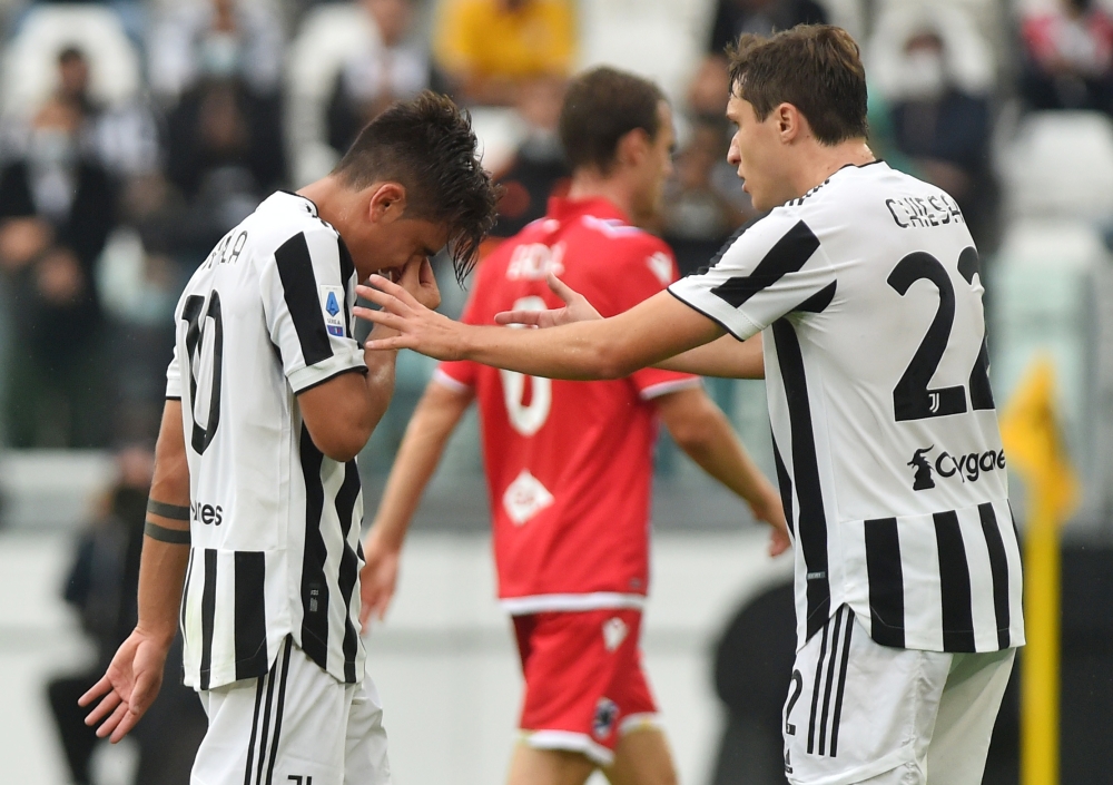 Juventus' Federico Chiesa looks on as Paulo Dybala is substituted after sustaining an injury REUTERS/Massimo Pinca