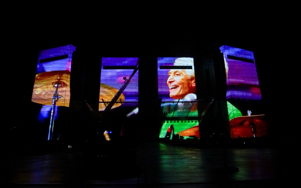A tribute to drummer Charlie Watts is played at the kick off The Rolling Stones' U.S. tour, a month after his death, in St. Louis, Missouri, U.S. September 26, 2021. REUTERS/Lawrence Bryant