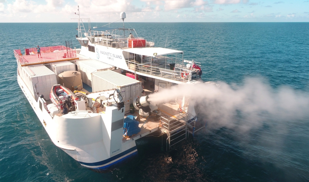 Plume from sprayer jets on a vessel is seen during the second field trial at Broadhurst Reef on the Great Barrier Reef, Queensland, Australia in March 2021, in this handout photo released to Reuters on September 27, 2021. Brendan Kelaher/Southern Cross Un