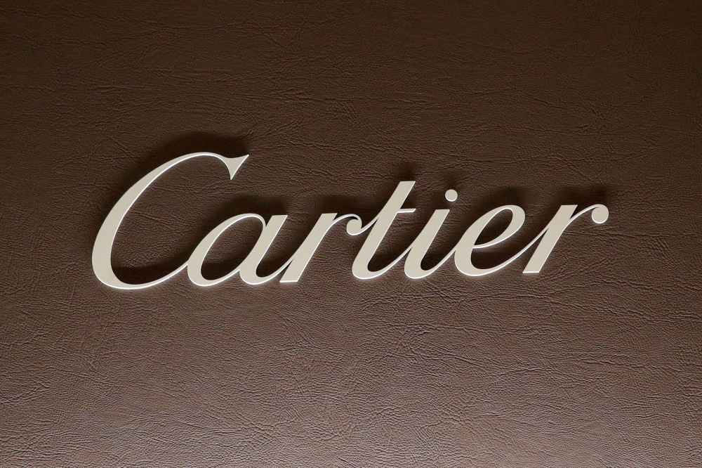 The logo of Cartier, owned by the Richemont group, is pictured at the 