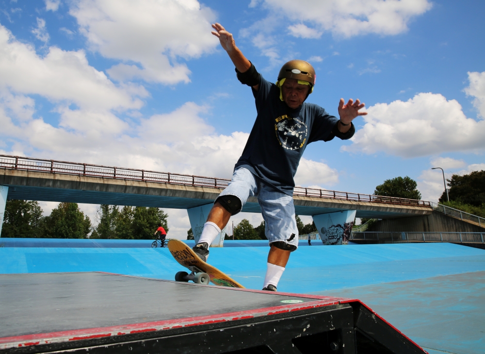 Yoshio Kinoshita practices skateboarding at a park in Daito, Osaka Prefecture, October 6, 2021. Reuters/Akira Tomoshige
