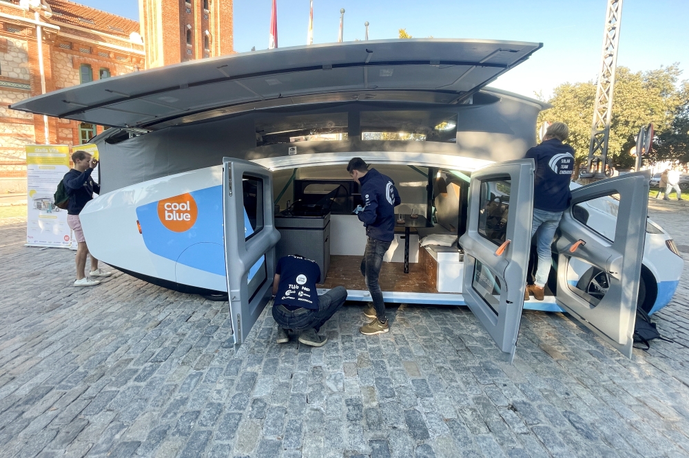 Students from Eindhoven's Technical University set up Stella Vita vehicle, a solar-powered motorhome designed by Dutch students to inspire car makers and politicians to accelerate the transition toward more sustainable modes of transport, as it's is parke