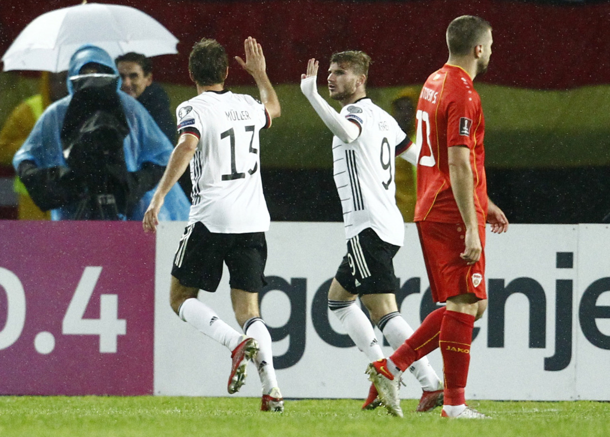 Germany's Timo Werner and Thomas Muller celebrate their first goal scored by Kai Havertz REUTERS/Ognen Teofilovski
